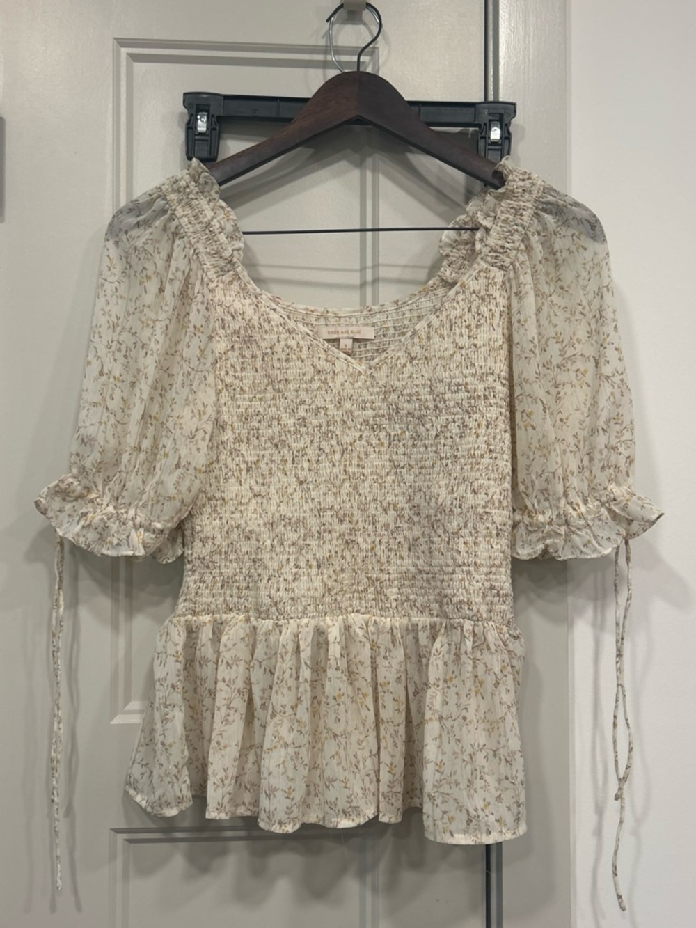 Smocked Peplum Floral Blouse in Cream